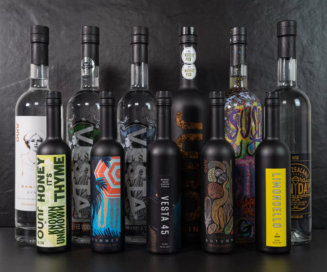 A line up of bottles of Juno's award winning spirits