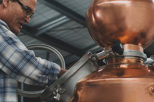 Dave looking into Lila the copper still