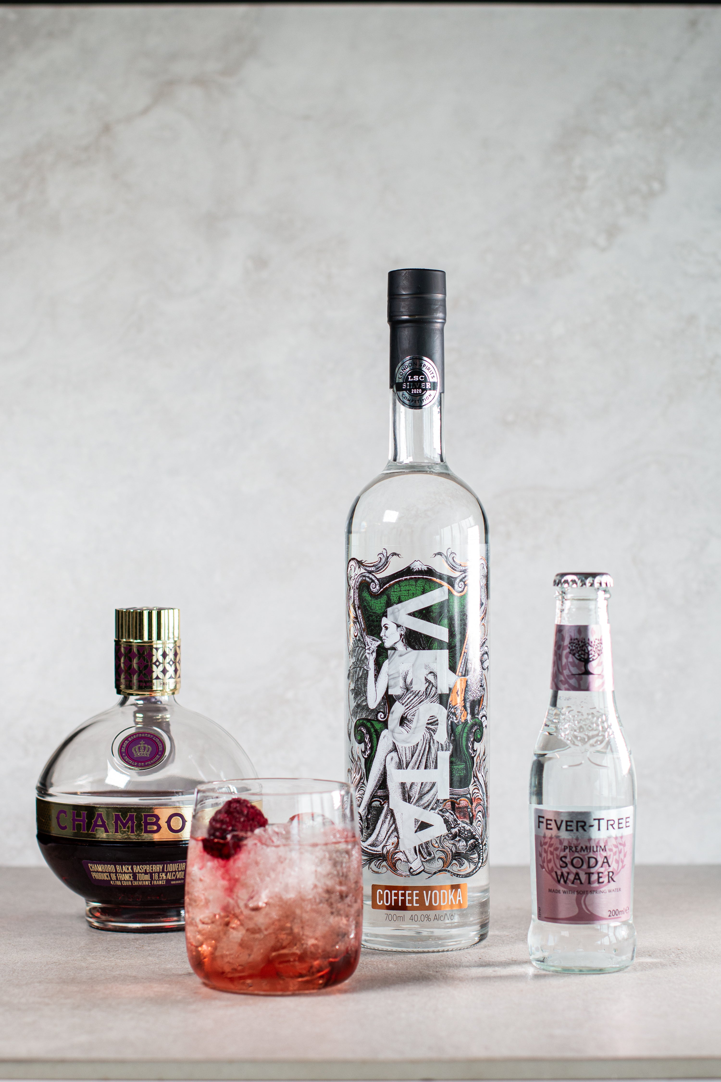A lifestyle photograph of The Dark Forest Cocktail Pack